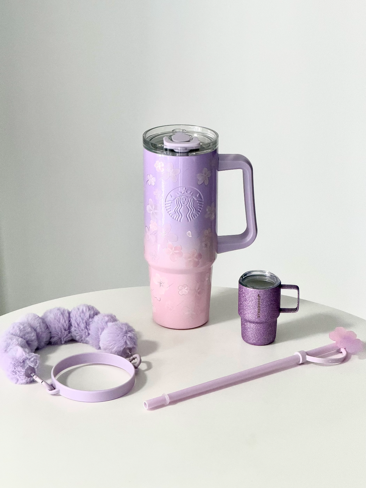 Starbucks Cherry Blossom Straw Tumbler 900ml with cup-shaped Charm display
