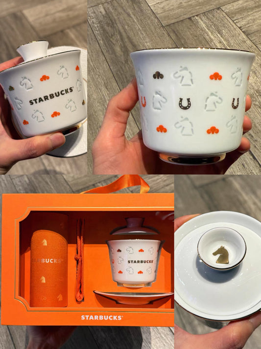 Starbucks Jingdezhen tea cup held in hand