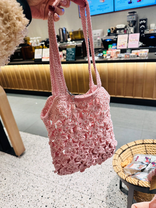 Starbucks Korea 2026 Cherry Blossom Pink Braided Bag on hand
